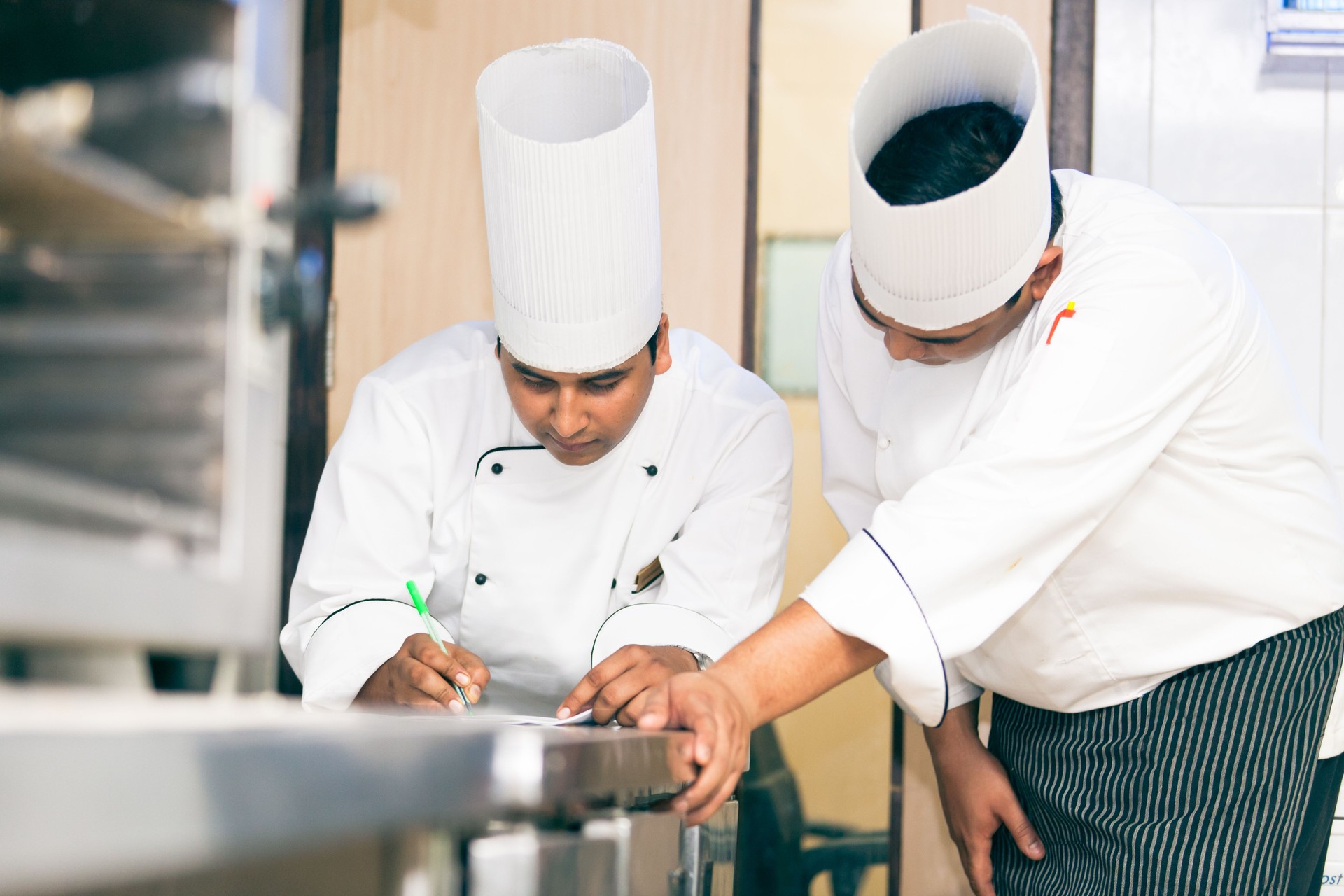 indian chefs planning the menu